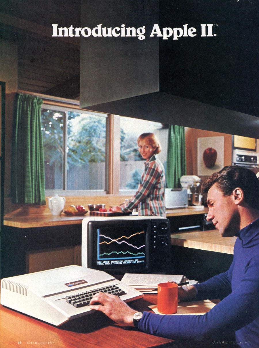 Introducing Apple II advertisement from December 1977 showing a man using the computer at a kitchen counter